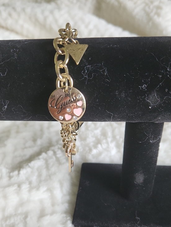 Guess Jewelry - GUESS Gold-Tone Charm Bracelet with Pink Heart Accents Boho Vibe